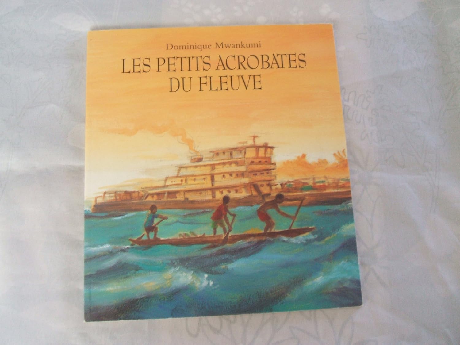 Dominique MWANKUMI : Les petits acrobates du fleuve